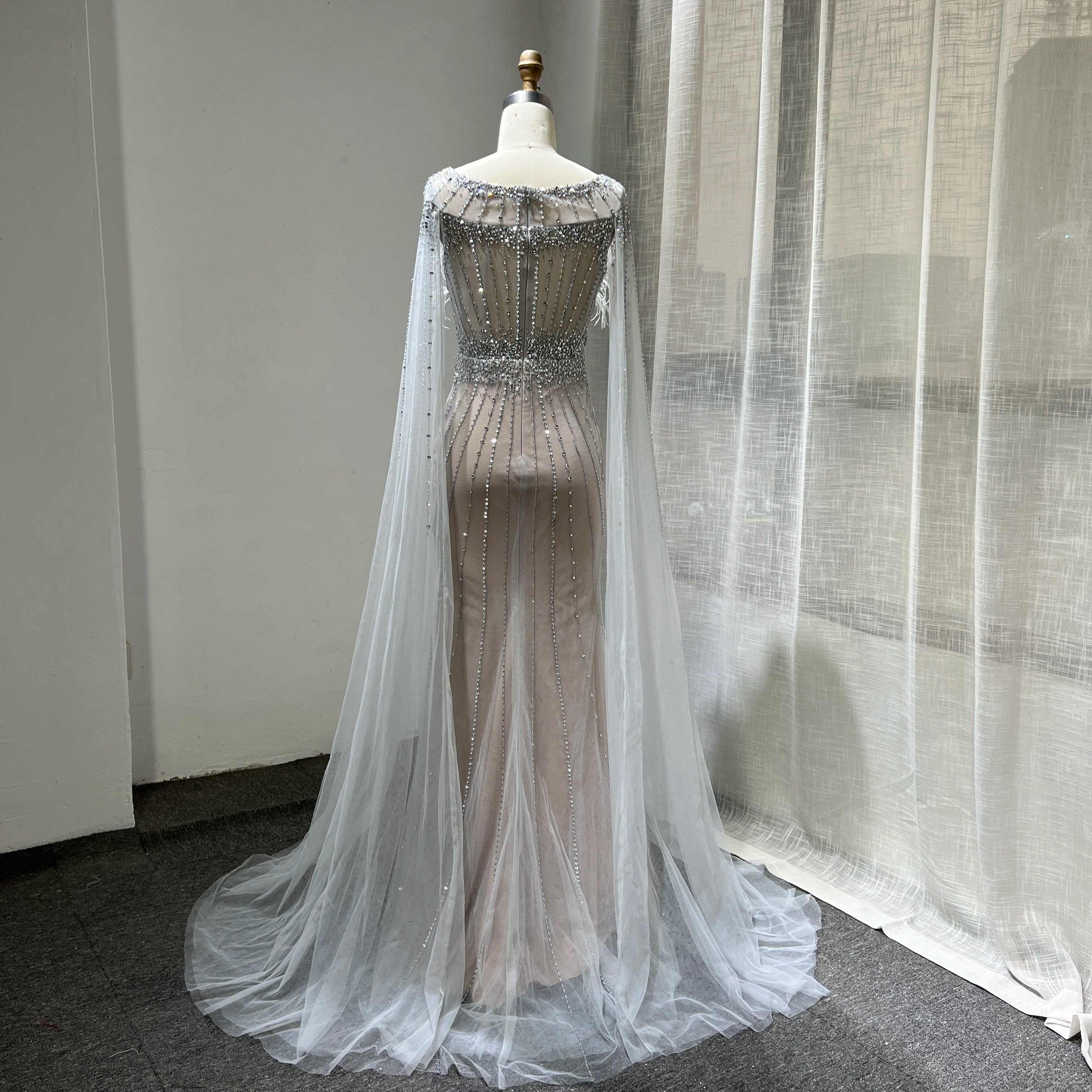 Luxury Silver Nude Elegant Mermaid Evening Dresses Gowns 2023 Feathers With Cape Sleeves Beaded for Women Party