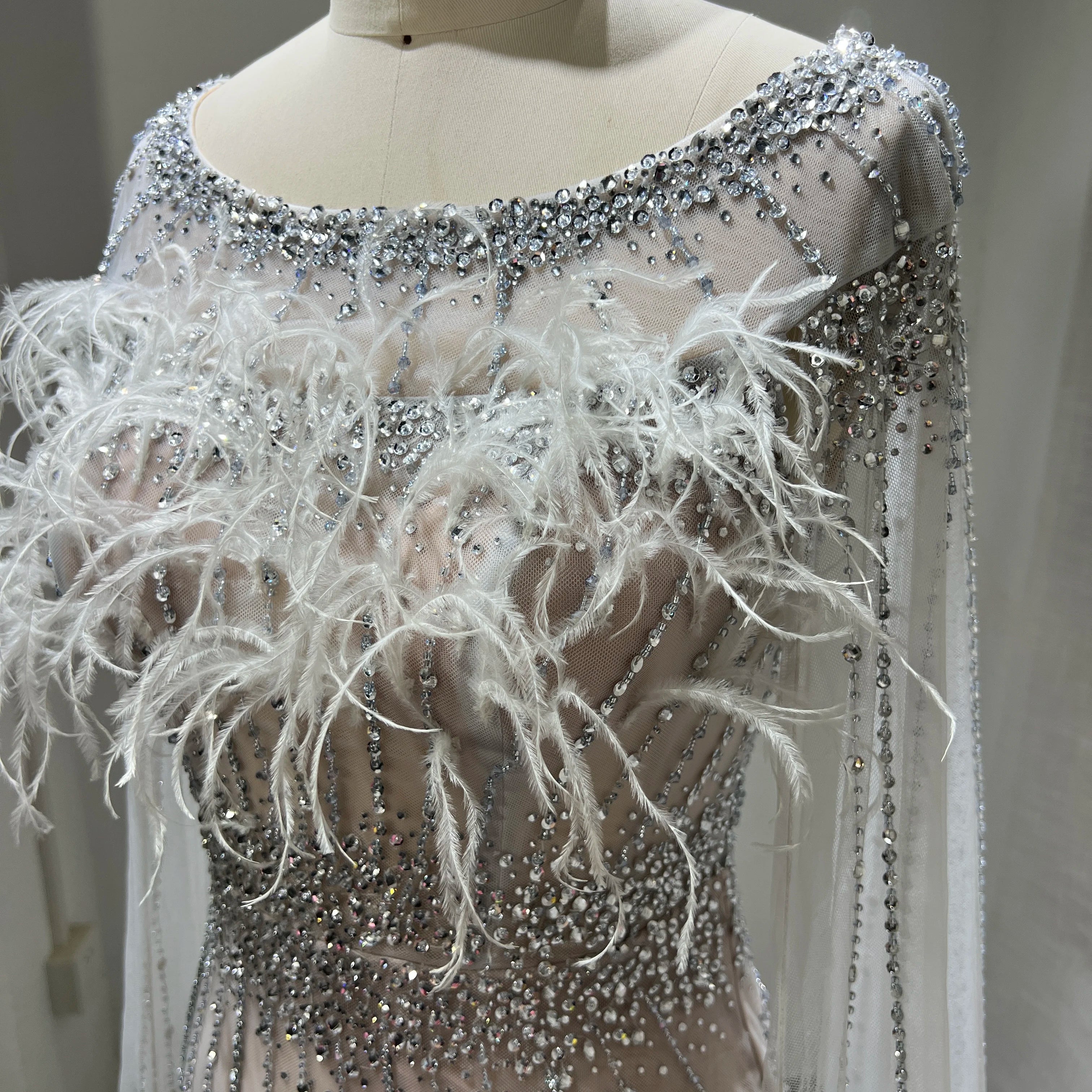 Luxury Silver Nude Elegant Mermaid Evening Dresses Gowns 2023 Feathers With Cape Sleeves Beaded for Women Party